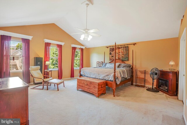 20338 Snowpoint Pl, Ashburn, VA 20147 - carpeted bedroom with a ceiling fan, lofted ceiling, and a glass covered fireplace