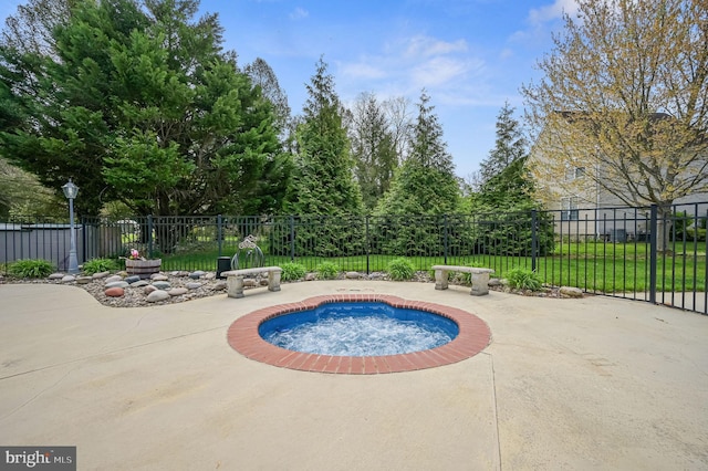 view of pool with a yard, fence, and a patio area