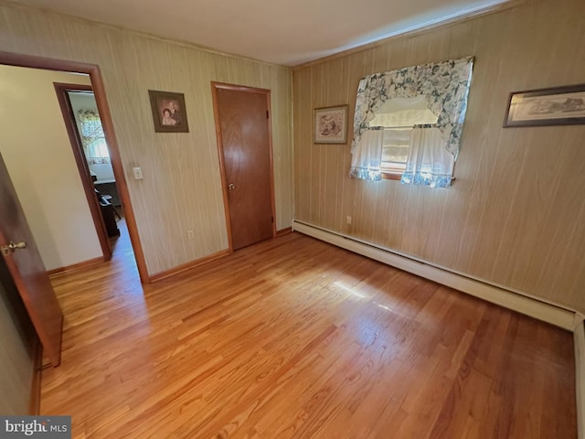 1222 Hoff Rd, Hanover, PA 17331 - unfurnished bedroom with a baseboard radiator and wood finished floors