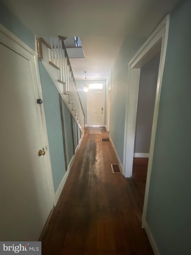 27 E Salisbury St, Williamsport, MD 21795 - corridor with wood-type flooring, stairs, and baseboards
