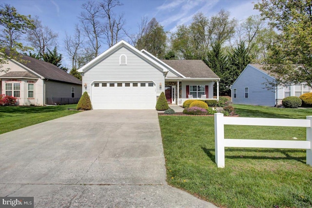 18 Lantern Ln, Shippensburg, PA 17257 - ranch-style home with a garage, driveway, a front yard, and covered porch