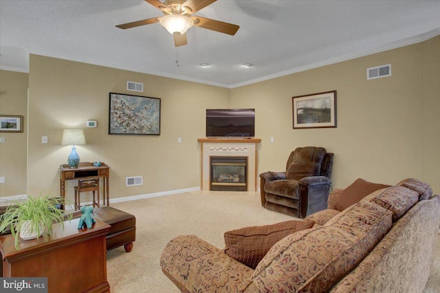 18 Lantern Ln, Shippensburg, PA 17257 - carpeted living area with a tiled fireplace, visible vents, and ceiling fan