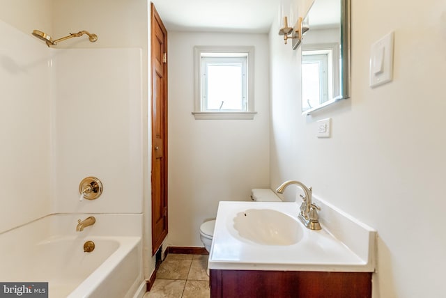 full bath featuring toilet, vanity, and tub / shower combination