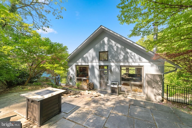 exterior space with fence and area for grilling
