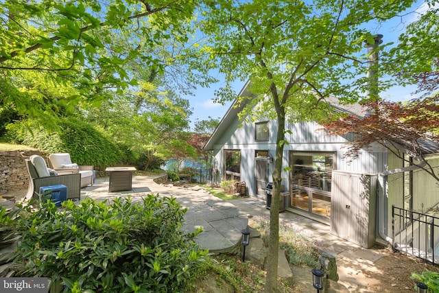 view of patio / terrace featuring fence