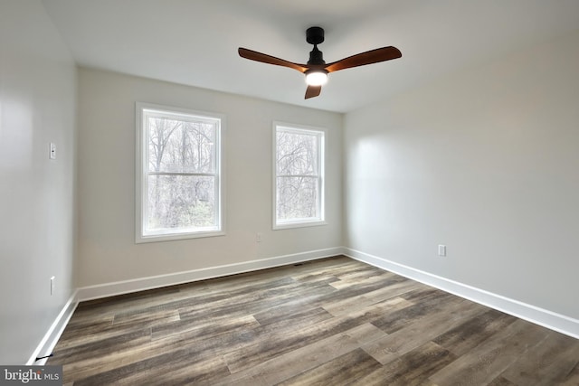 2741 Primrose Ln N, York, PA 17404 - spare room with dark wood-type flooring, baseboards, and ceiling fan