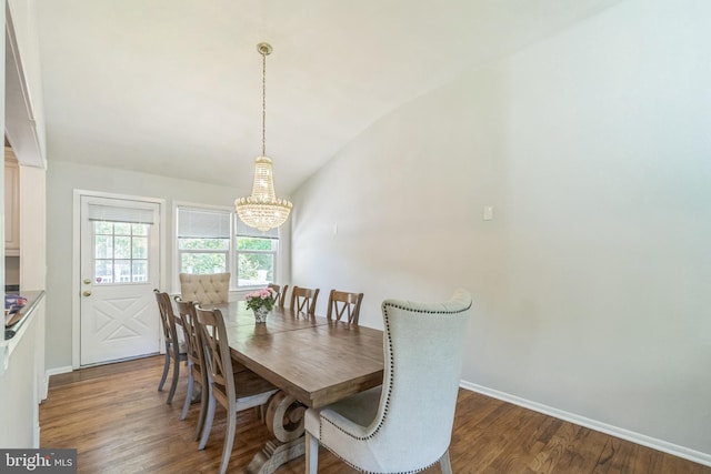 76 Briarwood Dr E, Berkeley Heights, NJ 07922 - dining room with a chandelier, lofted ceiling, wood finished floors, and baseboards