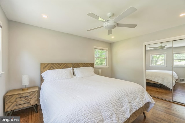 76 Briarwood Dr E, Berkeley Heights, NJ 07922 - bedroom with a closet, multiple windows, wood finished floors, a ceiling fan, and recessed lighting