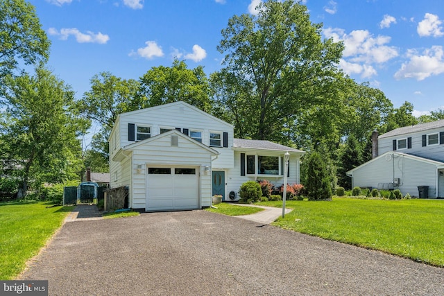 76 Briarwood Dr E, Berkeley Heights, NJ 07922 - tri-level home featuring a gate, a front yard, and asphalt driveway
