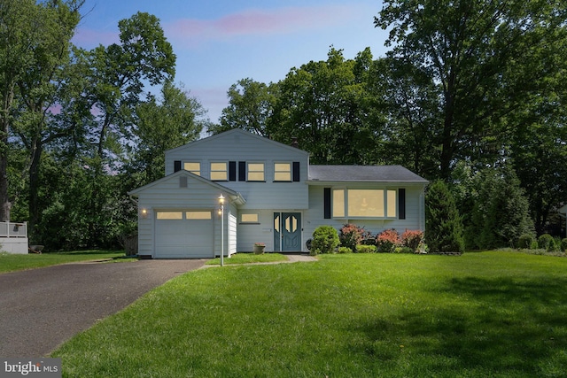 76 Briarwood Dr E, Berkeley Heights, NJ 07922 - tri-level home featuring asphalt driveway, a garage, and a front yard