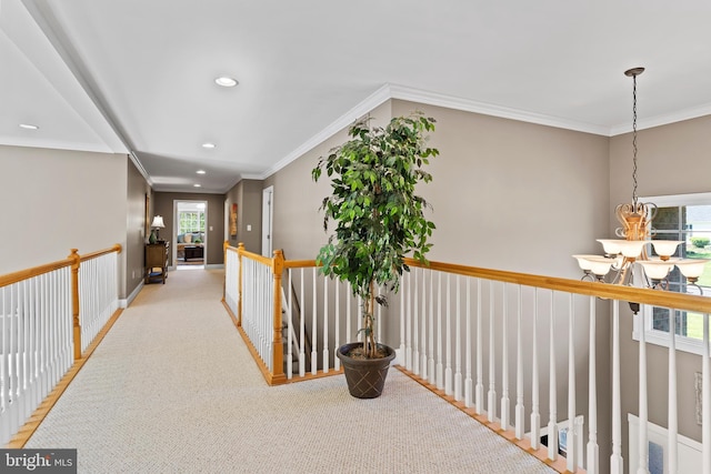 hall featuring crown molding, baseboards, an upstairs landing, carpet flooring, and recessed lighting