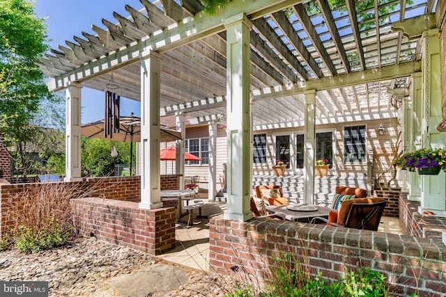 view of patio / terrace featuring a pergola