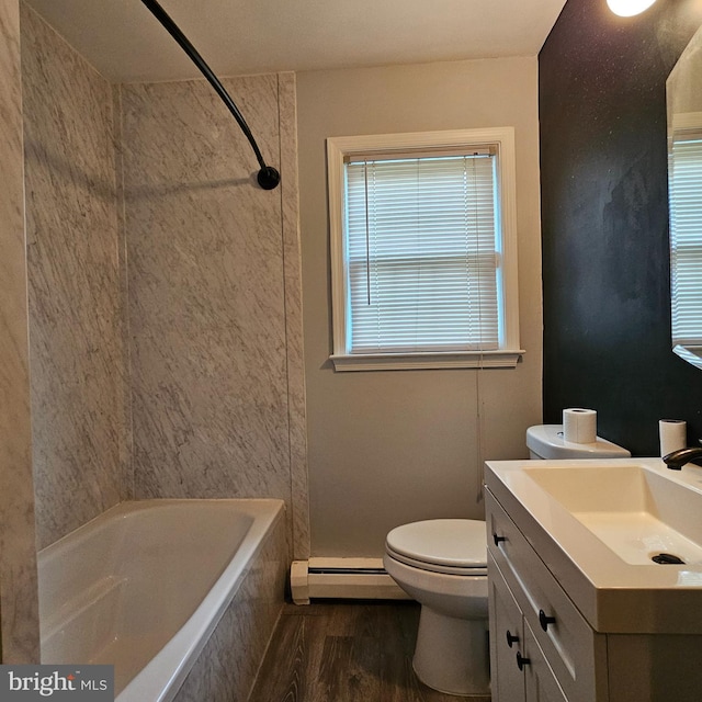 bathroom with baseboard heating, toilet, vanity, and wood finished floors