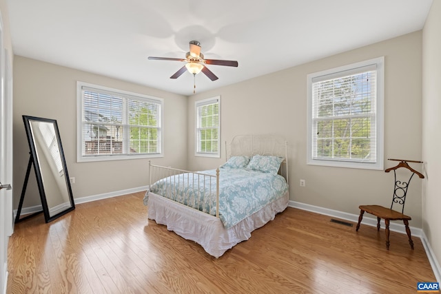 6348 Flintstone Dr, Barboursville, VA 22923 - bedroom featuring visible vents, light wood-style flooring, and baseboards