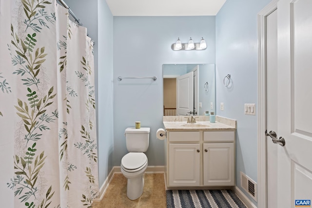 6348 Flintstone Dr, Barboursville, VA 22923 - full bathroom featuring visible vents, tile patterned flooring, vanity, baseboards, and toilet