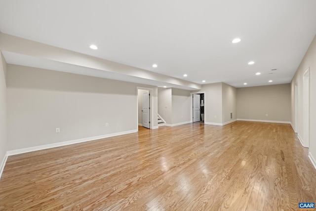 6348 Flintstone Dr, Barboursville, VA 22923 - finished below grade area featuring light wood-type flooring, recessed lighting, baseboards, and stairway
