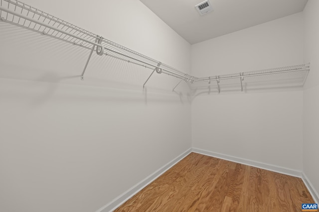 6348 Flintstone Dr, Barboursville, VA 22923 - walk in closet with visible vents and wood finished floors