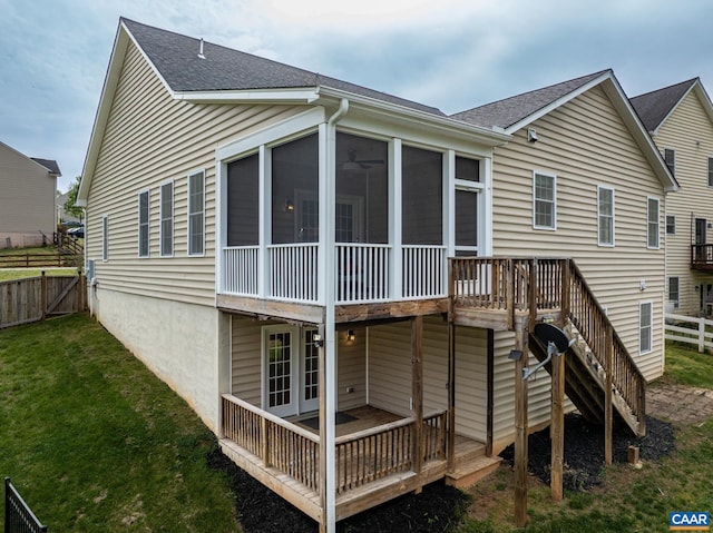 6348 Flintstone Dr, Barboursville, VA 22923 - back of house with a lawn, a wooden deck, a sunroom, fence, and stairs
