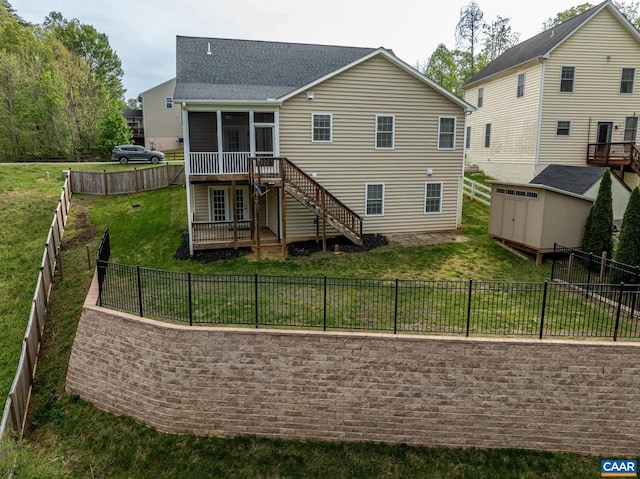 6348 Flintstone Dr, Barboursville, VA 22923 - rear view of house featuring roof with shingles, a sunroom, a storage unit, a yard, and stairway