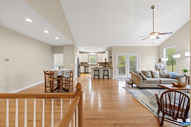 6348 Flintstone Dr, Barboursville, VA 22923 - living area featuring recessed lighting, a ceiling fan, high vaulted ceiling, and light wood-type flooring
