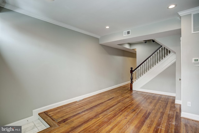 interior space with hardwood / wood-style flooring, stairs, visible vents, recessed lighting, and baseboards