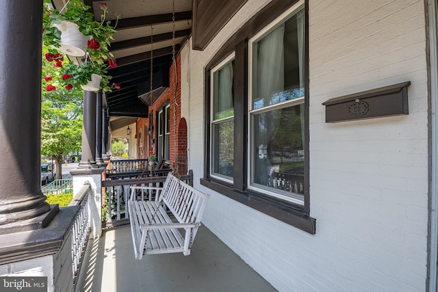 balcony featuring covered porch