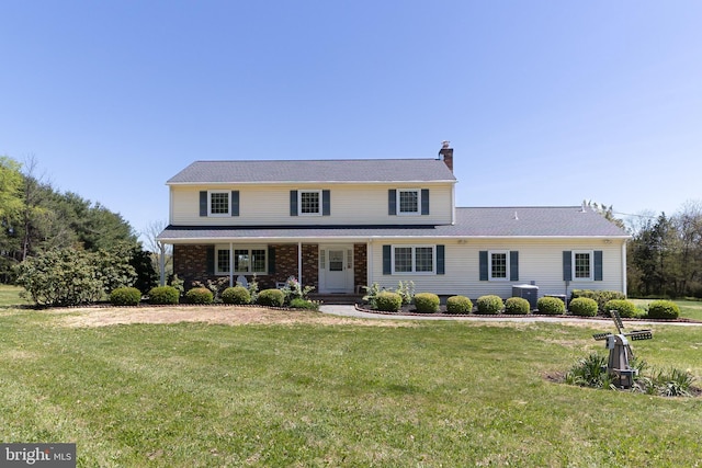 traditional home with central AC unit, a chimney, a porch, and a front lawn