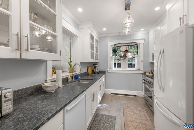 2616 Jefferson Park Cir, Charlottesville, VA 22903 - kitchen featuring a sink, ornamental molding, white appliances, baseboards, and white cabinetry