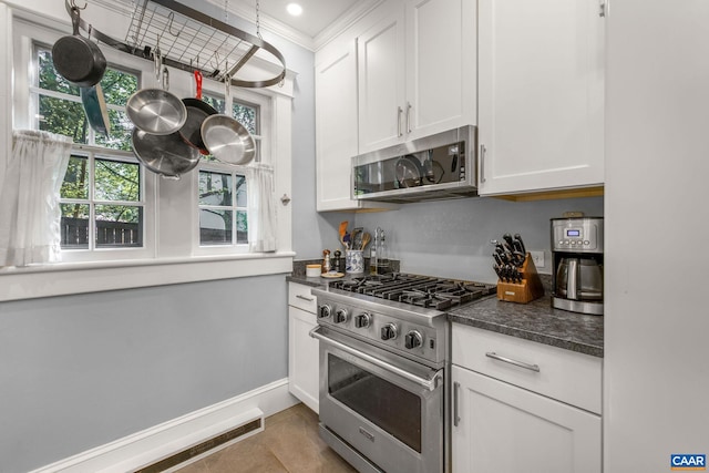 2616 Jefferson Park Cir, Charlottesville, VA 22903 - kitchen with baseboards, appliances with stainless steel finishes, crown molding, and white cabinetry