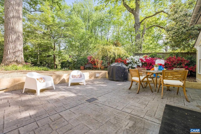 2616 Jefferson Park Cir, Charlottesville, VA 22903 - view of patio featuring fence, outdoor dining space, and area for grilling