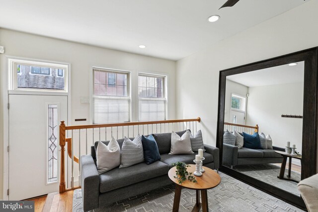 living room with recessed lighting and light wood finished floors