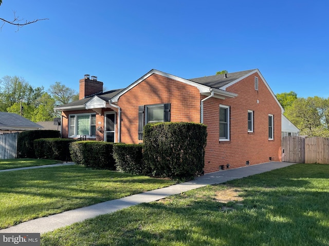 111 Montague Ave, Winchester, VA 22601 - view of front of home featuring a chimney, brick siding, and crawl space