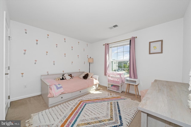 bedroom featuring carpet, visible vents, and baseboards