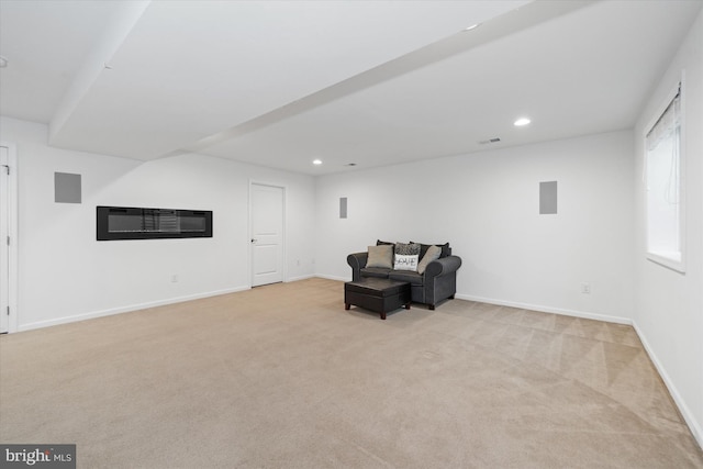 unfurnished room featuring light carpet, baseboards, and recessed lighting