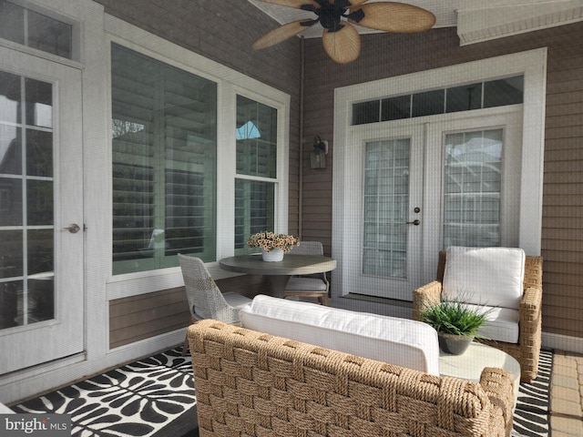exterior space with ceiling fan, french doors, and outdoor dining area
