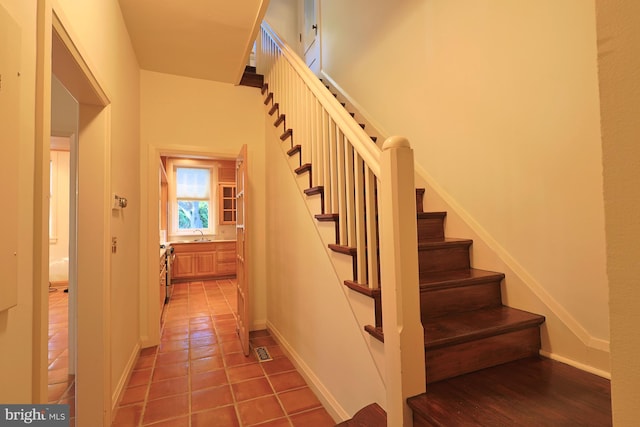 2203 N Grant Ave, Wilmington, DE 19806 - stairway with tile patterned flooring and visible vents