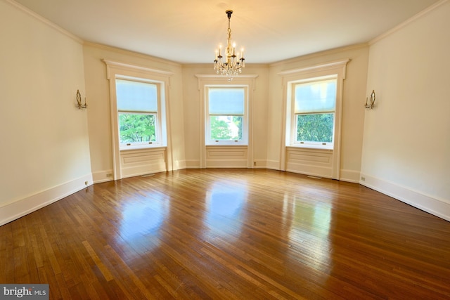 2203 N Grant Ave, Wilmington, DE 19806 - spare room featuring crown molding, an inviting chandelier, and plenty of natural light