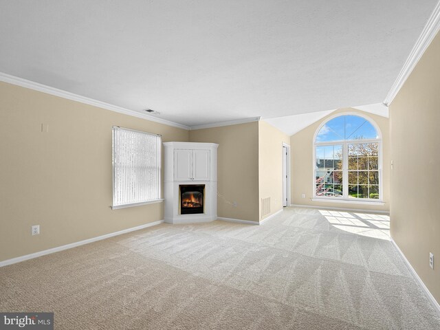 2002 Staghorn Dr, Mount Laurel, NJ 08054 - unfurnished living room featuring a glass covered fireplace, crown molding, visible vents, light carpet, and baseboards