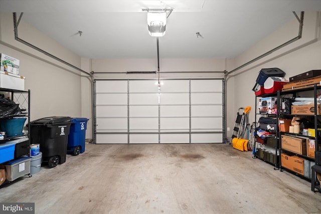 garage featuring a garage door opener