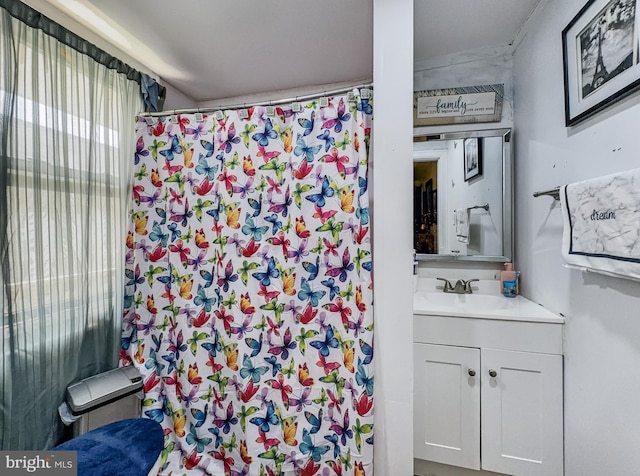 full bath with vanity and a shower with curtain