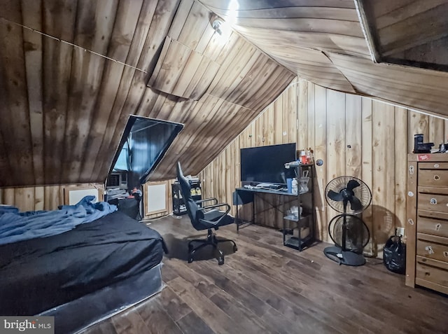 bedroom featuring wooden ceiling, wooden walls, wood finished floors, and lofted ceiling