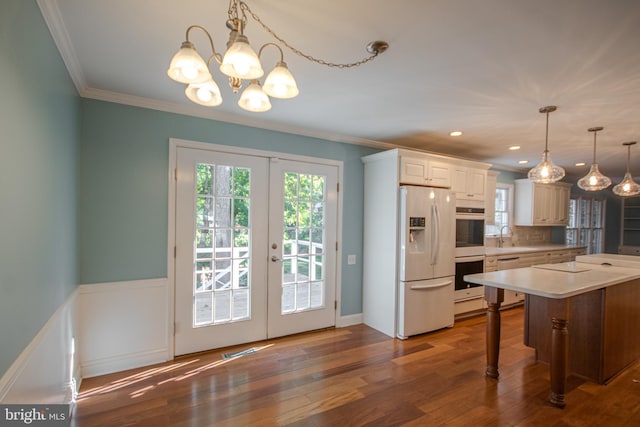 907 Riverside Rd, Salisbury, MD 21801 - kitchen with a sink, plenty of natural light, white appliances, and visible vents