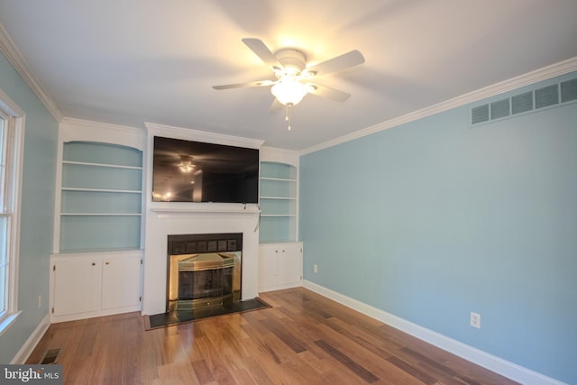 907 Riverside Rd, Salisbury, MD 21801 - unfurnished living room featuring ceiling fan, a fireplace with flush hearth, baseboards, and visible vents