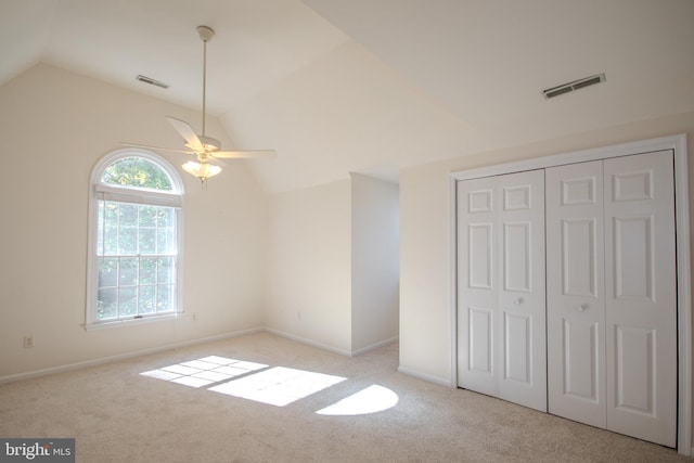 907 Riverside Rd, Salisbury, MD 21801 - unfurnished bedroom with visible vents, carpet, lofted ceiling, and a closet