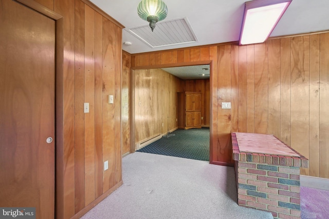5537 Eldorado Sharptown Rd, Rhodesdale, MD 21659 - corridor with baseboard heating, carpet floors, and wood walls