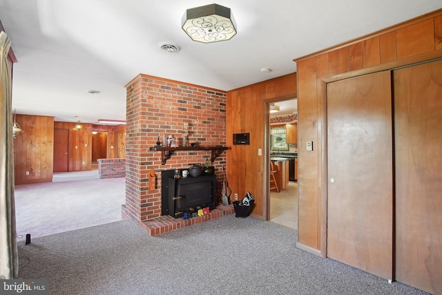 5537 Eldorado Sharptown Rd, Rhodesdale, MD 21659 - unfurnished living room with carpet floors and wood walls
