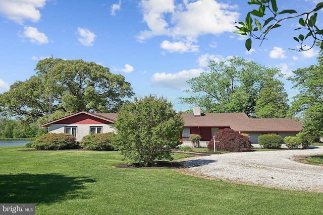 5537 Eldorado Sharptown Rd, Rhodesdale, MD 21659 - single story home featuring a front lawn, a chimney, driveway, and a water view