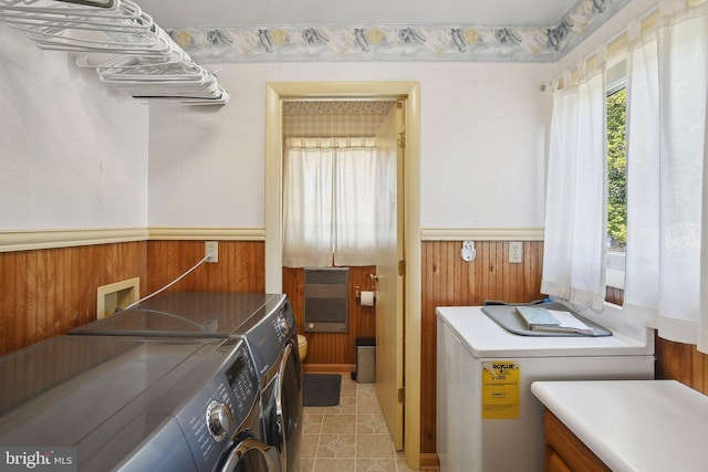 5537 Eldorado Sharptown Rd, Rhodesdale, MD 21659 - clothes washing area with independent washer and dryer, a wainscoted wall, cabinet space, and wooden walls