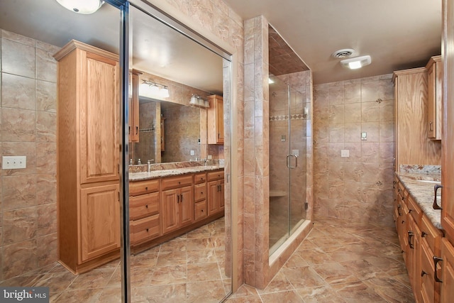 5537 Eldorado Sharptown Rd, Rhodesdale, MD 21659 - full bathroom with tile walls, a stall shower, and vanity