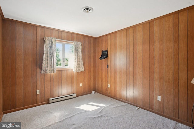 5537 Eldorado Sharptown Rd, Rhodesdale, MD 21659 - carpeted spare room with baseboard heating, wooden walls, and baseboards